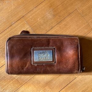 Used Brown leather roots zip around wallet